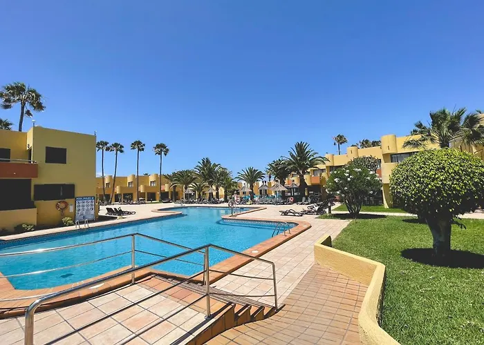 Seaside Apartment Corralejo : A Cozy Holiday Home In A Peaceful Well Located Green Complex