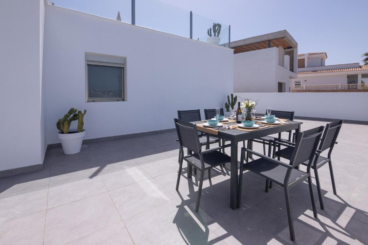 Family 6 Beachfront By Holidays Apartment