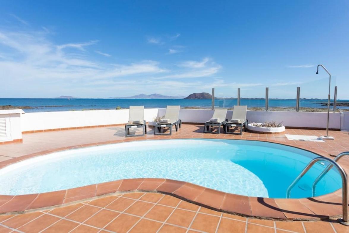 Villa Beachfront Remos With Lobos Island View, Private Pool, Wifi & Bbq By Amazzzing Travel
